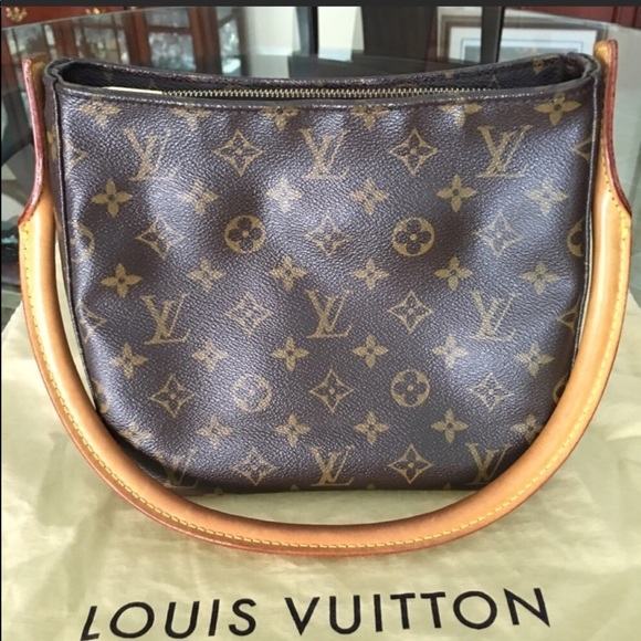 Louis Vuitton Handbags - Louis Vuitton Hand Bag 100% AUTHENTIC .